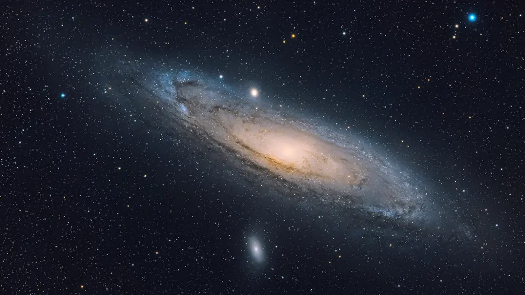Andromeda Galaxy showing its large spiral shape with curved arms around the center.