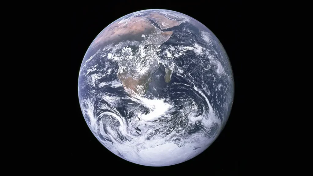 Blue Marble 1972, iconic Earth photo taken by NASA's Apollo 17 mission. Blue Marble 1972 photo of Earth taken by NASA from space.